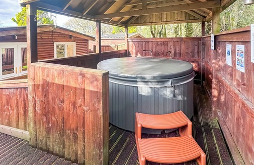 Ystradgynlais Ski Chalet | Open plan lodge with two doubles, both with TV/DVD.