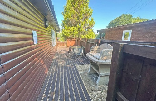 Ystradgynlais Ski Chalet | Open plan lodge with two doubles, both with TV/DVD.