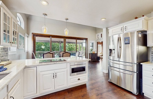 Burnet House | Opulent waterfront home with dock, firepit & stunning river view