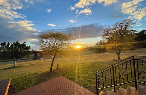 Lovedale Cottage | Orange cottage in Lovedale