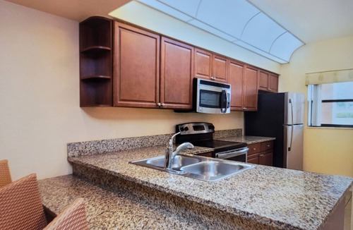 Florida Central Atlantic Coast Resort | Orlando 2BR Resort Villa Sleeps 8 Pools,Spa-Full Kitchen Near Disney-Universal
