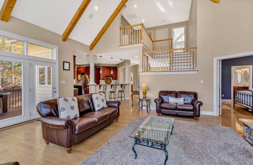 Moneta House | Osprey Cove - Custom Lakefront home with 2-story dock, Wifi, Game Room and Fireplace
