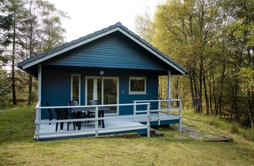 Crianlarich Ski Chalet | Otter with mountain view and enclosed decking