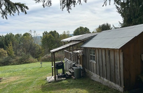 Unadilla Cabin | Our Rustic off grid Serenity Camp is 190 sq ft and 2300 feet through the woods.