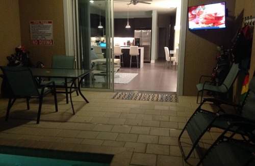 Four Corners House | Outstanding, owner operated Townhome, even a TV in the pool area!