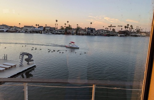 Discovery Bay House | Over the water experience in Biggest Bay/w Water Toys, Beach nearby. Waterfront