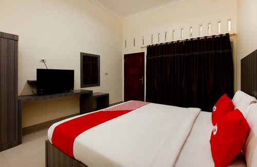 Ambarita Hotel | OYO 1694 Pariban Homestay