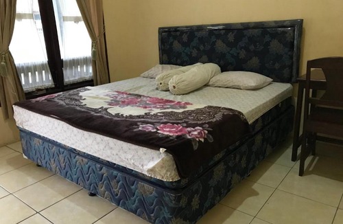 Tjimadja Hotel | OYO 2681 Pondok Mutiara