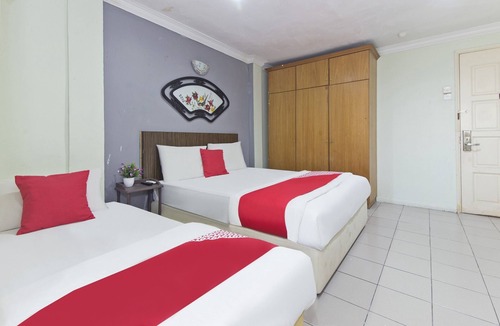 Kampung Sungai Raya Hotel | OYO 90118 Suntex Hotel