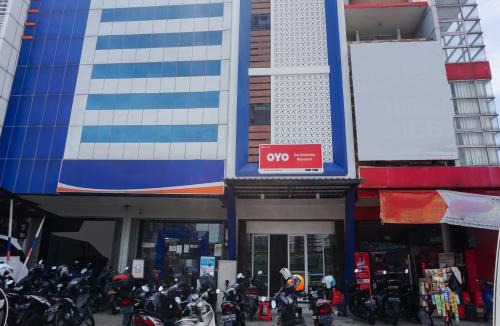 South Tangerang Hotel | OYO 90305 De Umbrela Mansion Syari'ah Ciputat
