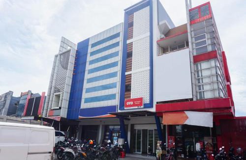South Tangerang Hotel | OYO 90305 De Umbrela Mansion Syari'ah Ciputat