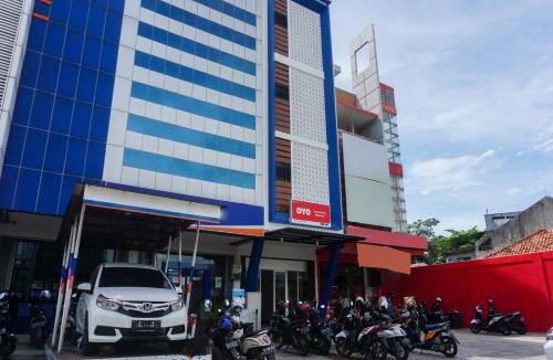 South Tangerang Hotel | OYO 90305 De Umbrela Mansion Syari'ah Ciputat