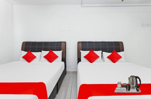 Gua Hotel | OYO 90873 Travellers Inn