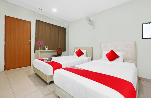 Gua Hotel | OYO 90873 Travellers Inn
