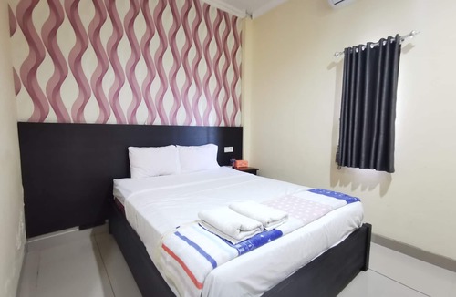 Sangatta Utara Hotel | OYO 95059 Ikon Guesthouse