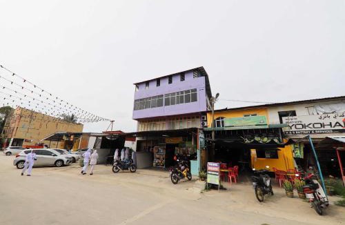 Rambai Hotel | OYO HOME 90647 Mac Inn 94