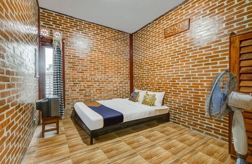 Turi Hotel | OYO Homes 90996 Desa Wisata Pulesari Syariah