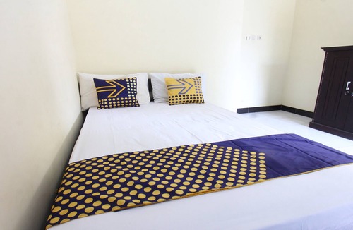 Tanjung Hotel | OYO Life 93155 Wisma Sarah