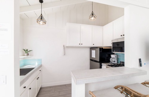 Townsite Condo | Pacific Villa #1 | Relaxing Oceanfront Patio Views