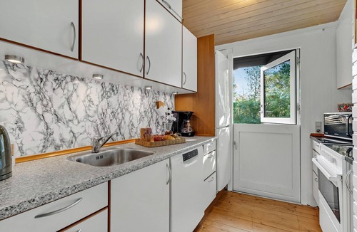 Sønder Ydby House | Pack your bags and enjoy your next holiday in this oasis by the fjord.