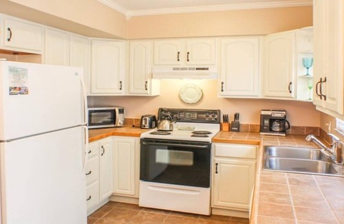 Holmes Beach Villa | Palm Oasis East Villa, Shared Heated Salt Pool, Steps to the Beach, Ground Level