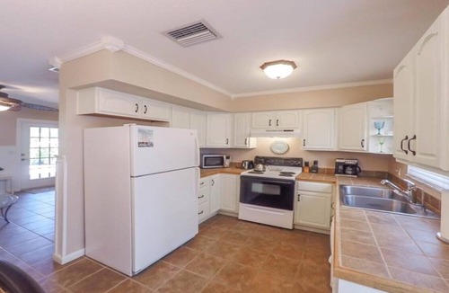 Holmes Beach Villa | Palm Oasis East Villa, Shared Heated Salt Pool, Steps to the Beach, Ground Level