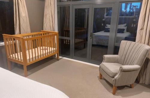 Papamoa Beach House | Palm Paradise with Spa