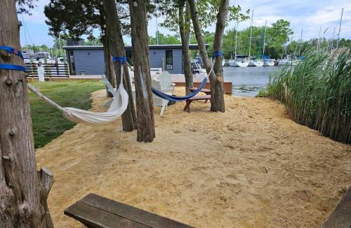 Forked River Boat Rental | Panama Float Home Riverfront Fire Pit