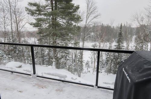 Chertsey House | Panoramic Lakefront Chalet with Hot Tub & Firepit