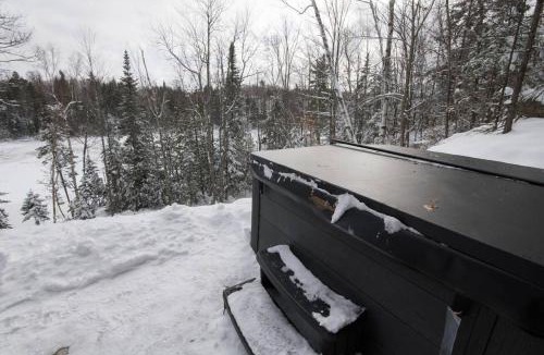 Chertsey House | Panoramic Lakefront Chalet with Hot Tub & Firepit