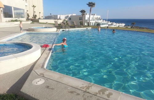 Rosarito Condo | Panoramic White Water Views from this Former Model Home