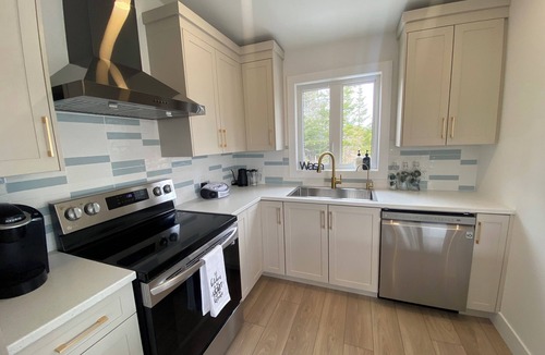 Clam Bay House | Panthers Pad and Tiger Den with two Hot Tubs