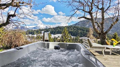Rougemont Ski Chalet | Paradise View - 5 BR Gstaad Paradise View Chalet with Outdoor Jacuzzi