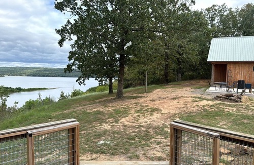 Waveland Cabin | Paradiso sunrise waterfront cabin sleeps 10 with large open room and AC, WiFi