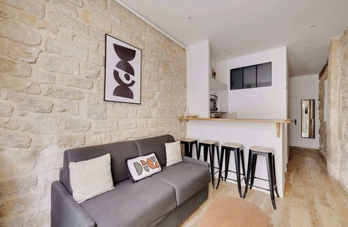 Quartier de la Porte-Saint-Denis Apartment | Paris Hideaway: Private Cinema – GetHosted