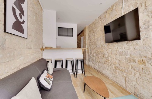 Quartier de la Porte-Saint-Denis Apartment | Paris Hideaway: Private Cinema – GetHosted