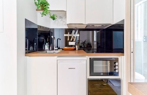 Batignolles Apartment | Parisian Charm: Modern & Quiet