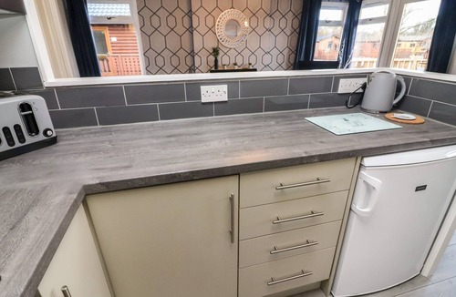 Warton Cottage | PARK VIEW LODGE, ARNSIDE 7, pet friendly, with pool in Carnforth