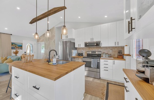 Riverside House | Park View Retreat with Hot Tub and King Size Bed