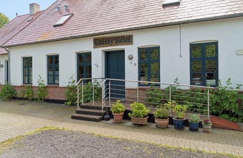 Østermarie Apartment | Part of a closed-down village school.