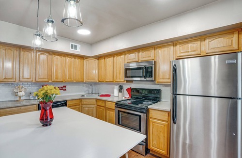 Willow Grove House | Patio + Fire Pit: Central Willow Grove Home