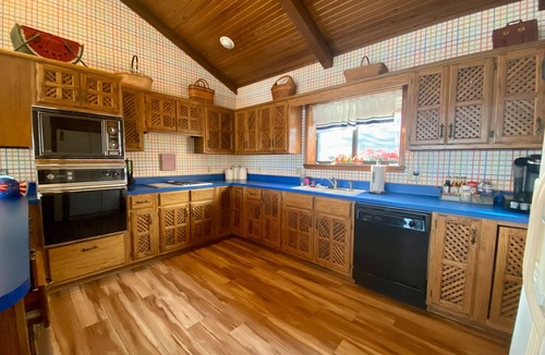 Afton House | Peaceful 2 acre Lakefront Home in Duck Creek w/Boat Dock, Game Room w/Wet Bar