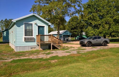 Lake Village Cottage | Peaceful cabin in orchard! Great Internet!