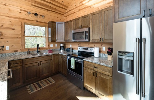 Fairview Cabin | Peaceful Cabin with mountain view! Hot tub, fire-pit and indoor fireplace!