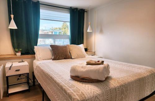 Quartier 5-4 Apartment | Peaceful City View - Hot Tub - 2 Parking & EV Chrger