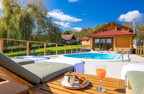 Petrinja House | Peaceful countryside retreat with pool, jacuzzi, sauna, tennis, and river views.