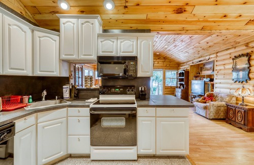 Brant Lake House | Peaceful lakefront house with private dock and sandy beach