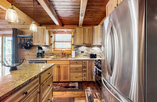 New Lisbon House | Peaceful log cabin with patio, gas grill, fire pit & WIFI
