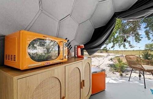 Wolfe City House | Peaceful Luxury Glamping Domes with Stargazing & Farm Retreat near Lake Access in Wolfe City, Texas
