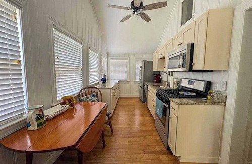 Pocasset House | Peaceful marshview escape with large sunroom, AC, outdoor firepit & dog friendly